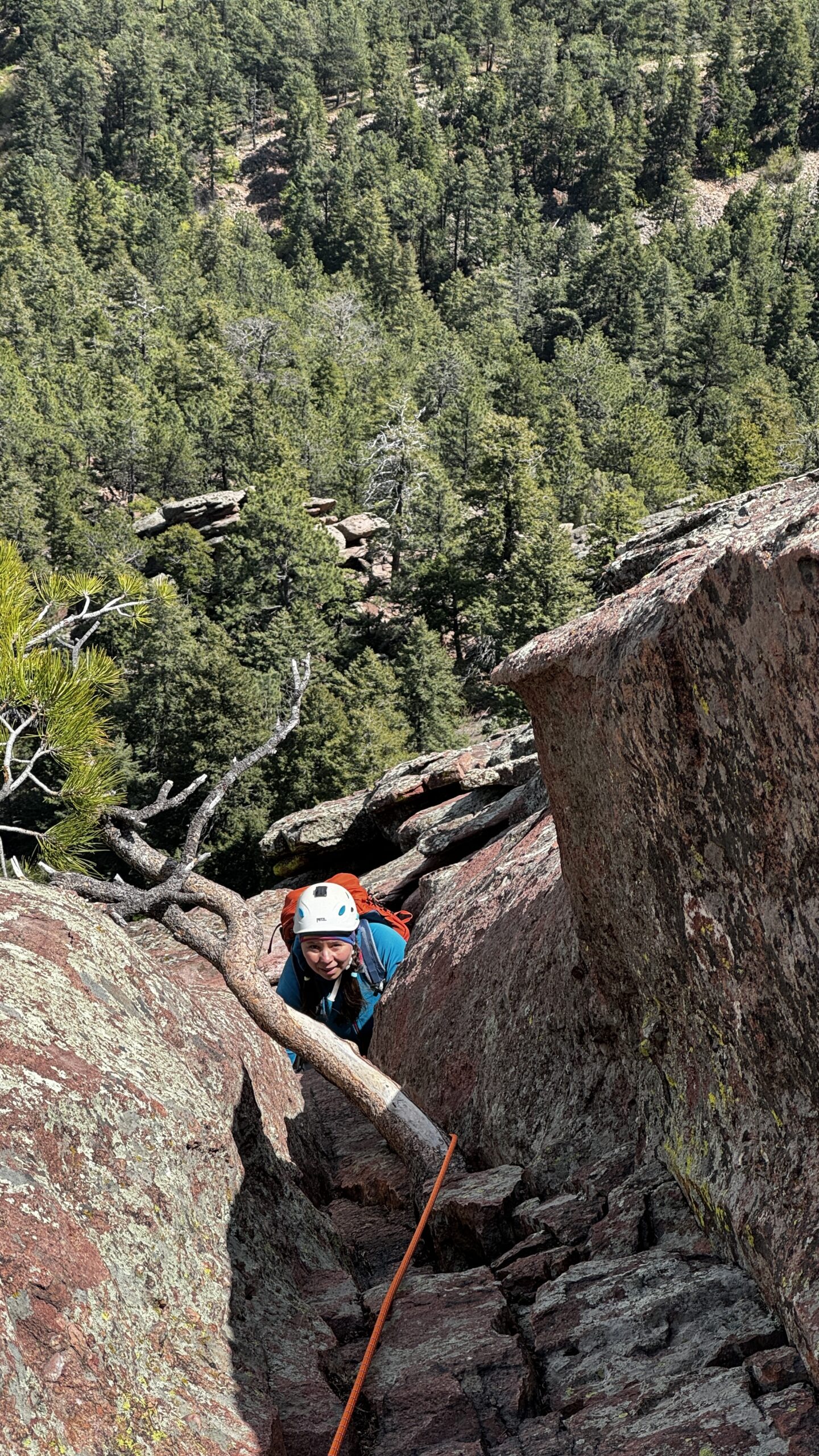 Climbers ascending the Flatirons in Boulder, Colorado.