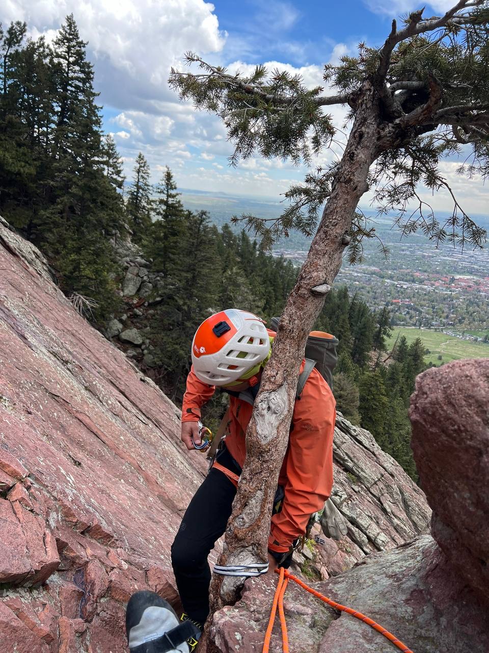 Climbers ascending the Flatirons in Boulder, Colorado.