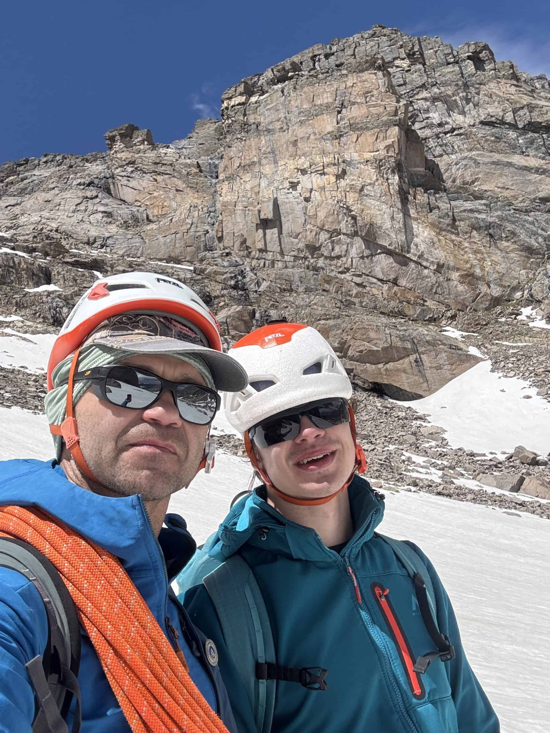 Mountain guide and climber below the South Ridge of Mount Pagoda in Rocky Mountain National Park