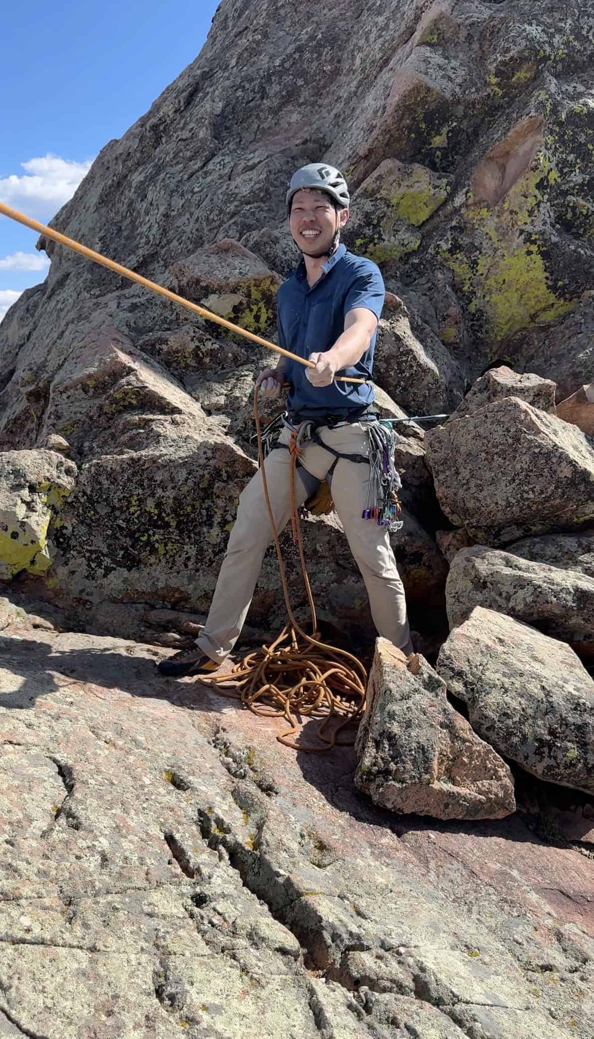 Trad climber practicing rope techniques during a multi-pitch class in Colorado